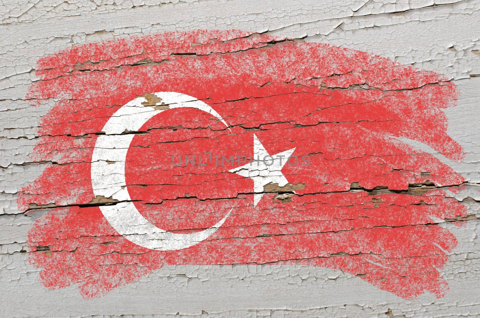Chalky turkish flag painted with color chalk on grunge wooden texture