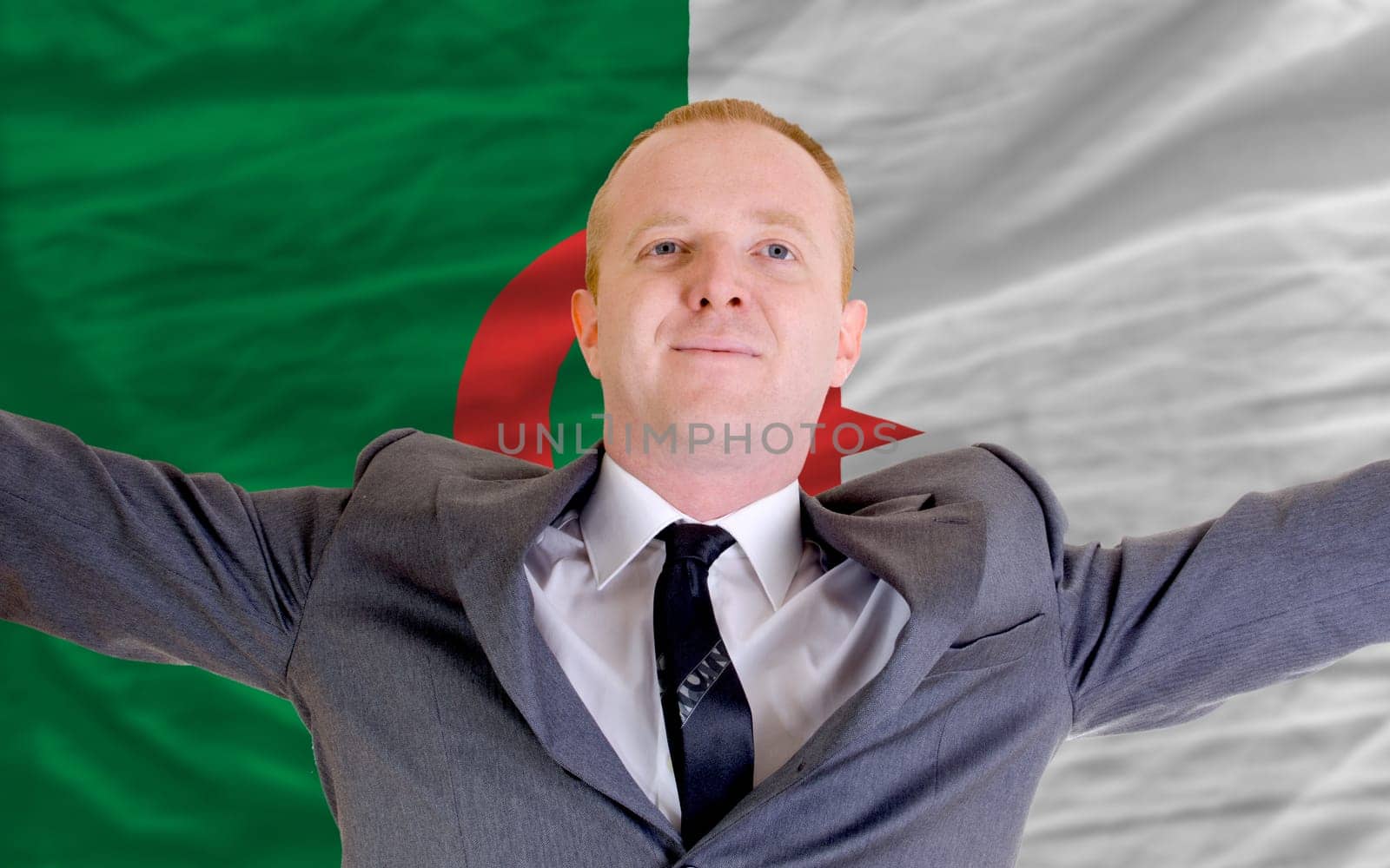 joyful investor spreading arms after good business investment in algeria