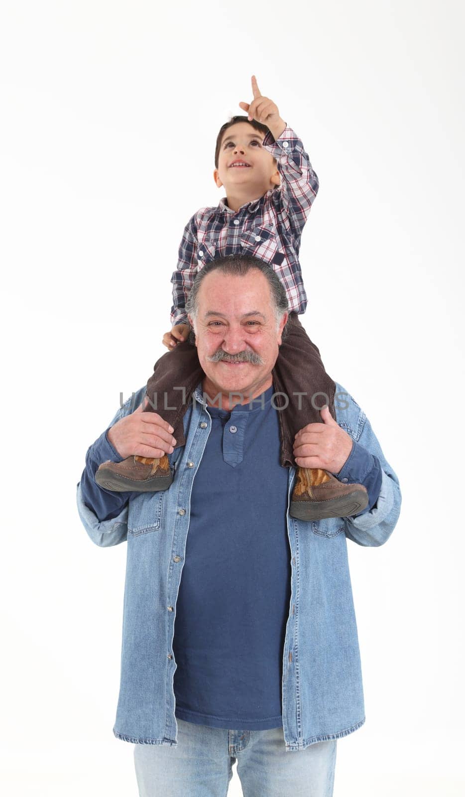 Child and grandfather stay together on white background