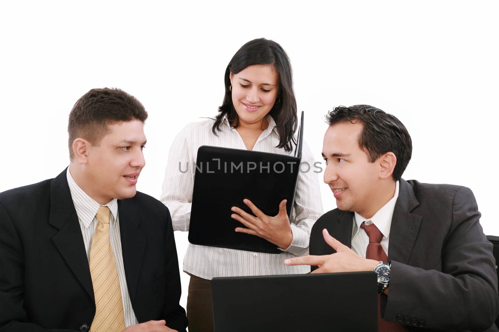 Businesspeople working together at meeting table in office