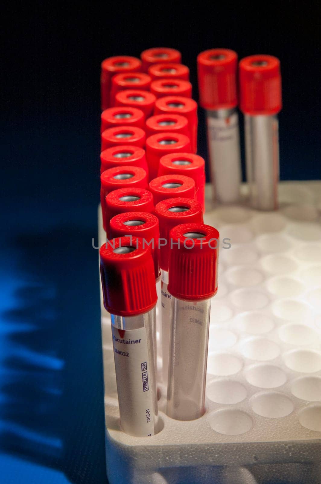 Red headed test tubes placed at curved lines