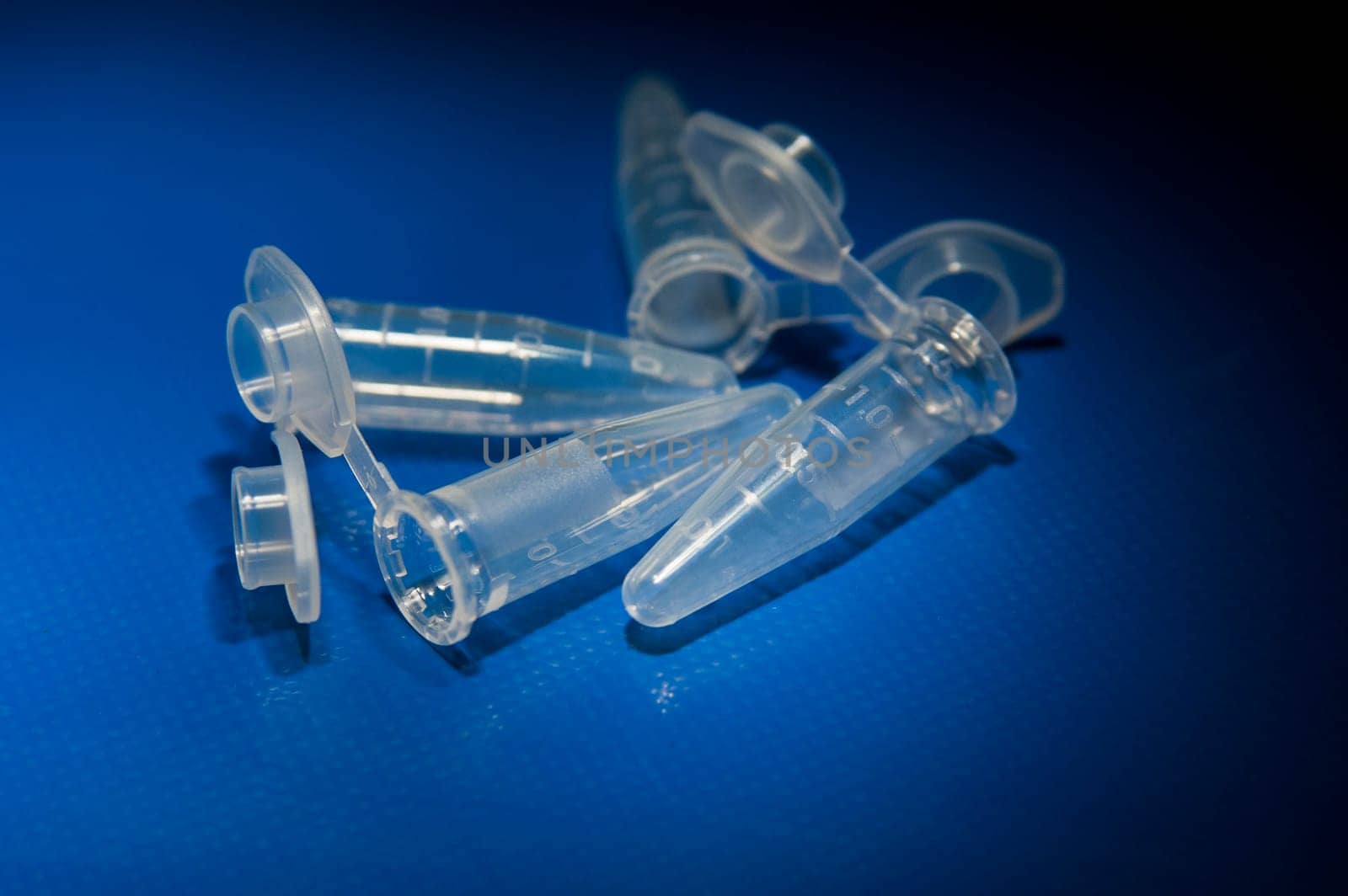 Test tubes laying on table empty and open