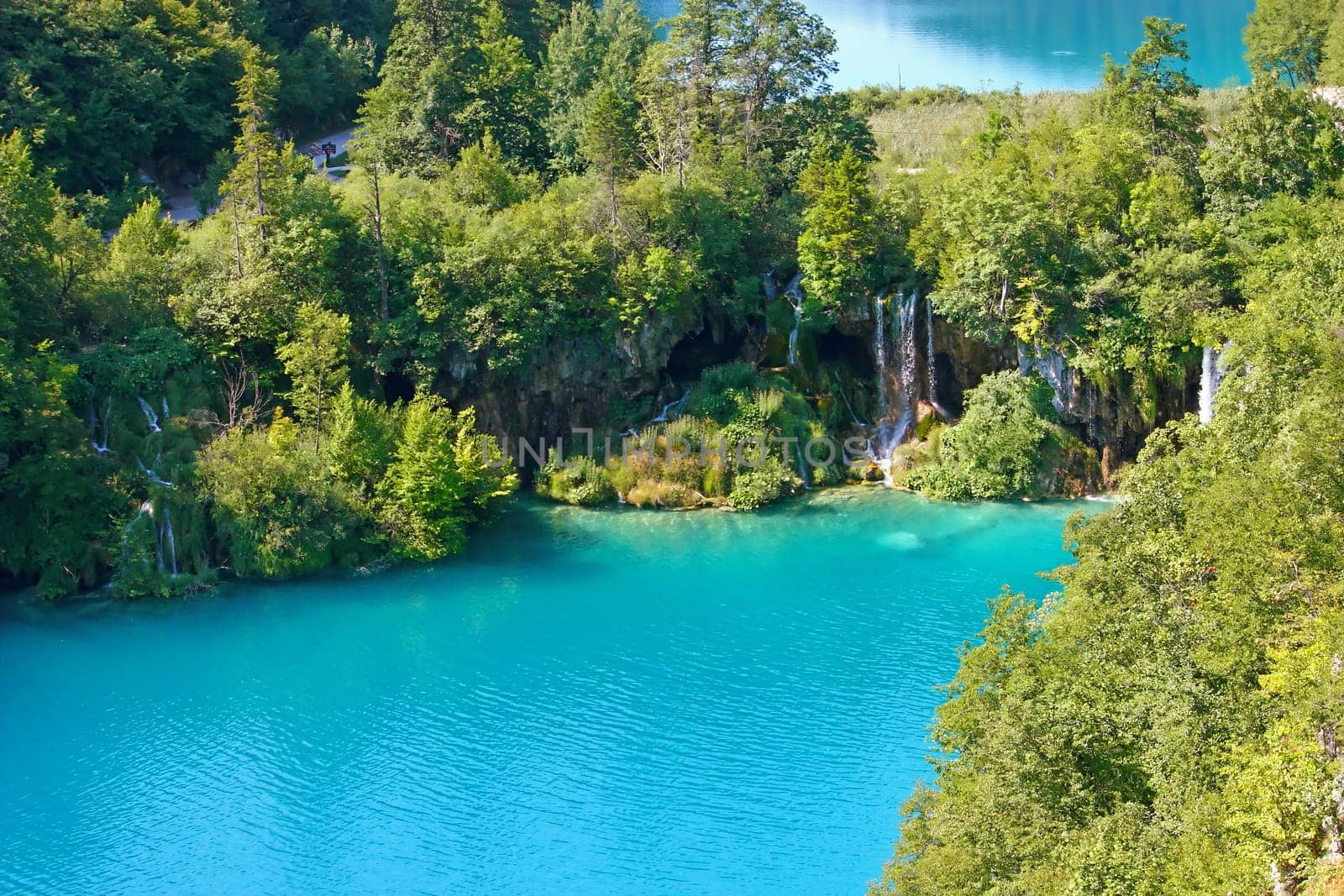 Summer landscape with beautiful waterfalls in the Plitvice Lakes in Croatia