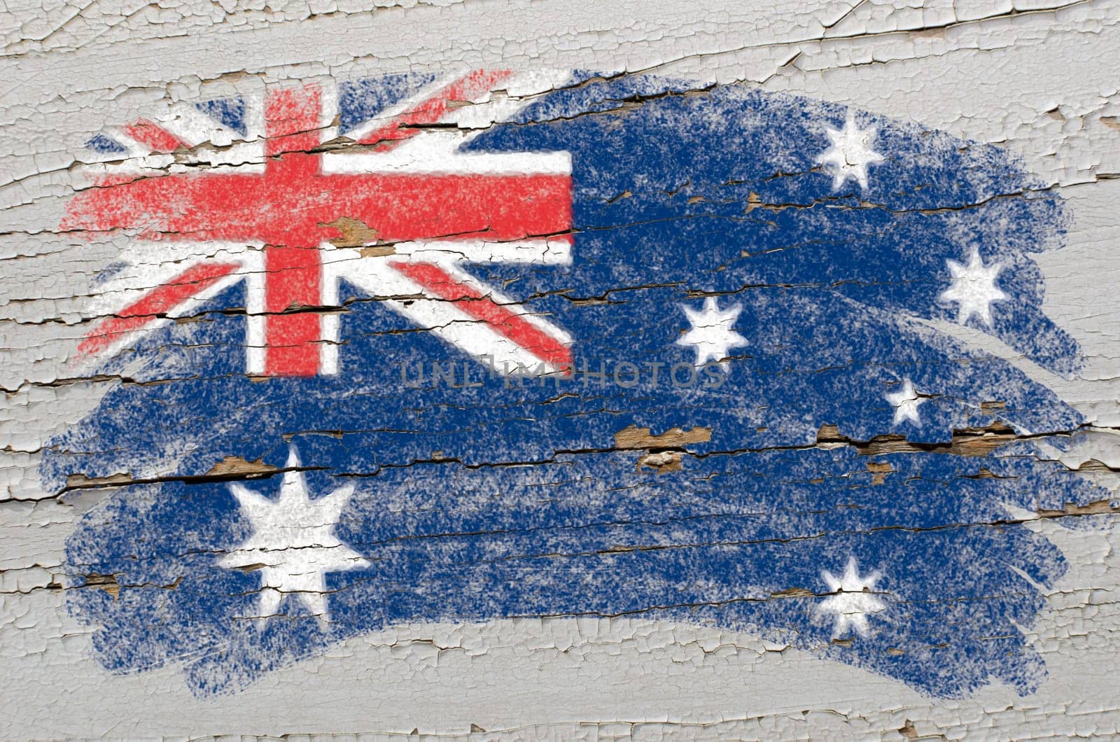 Chalky australian flag painted with color chalk on grunge wooden texture