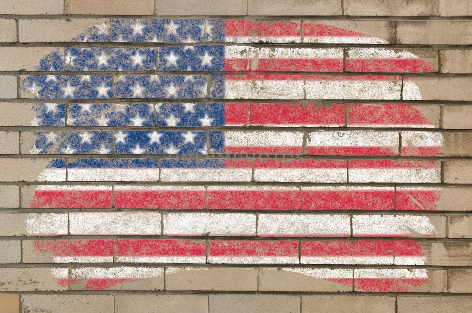 Chalky united states of america flag painted with color chalk on grunge old brick wall