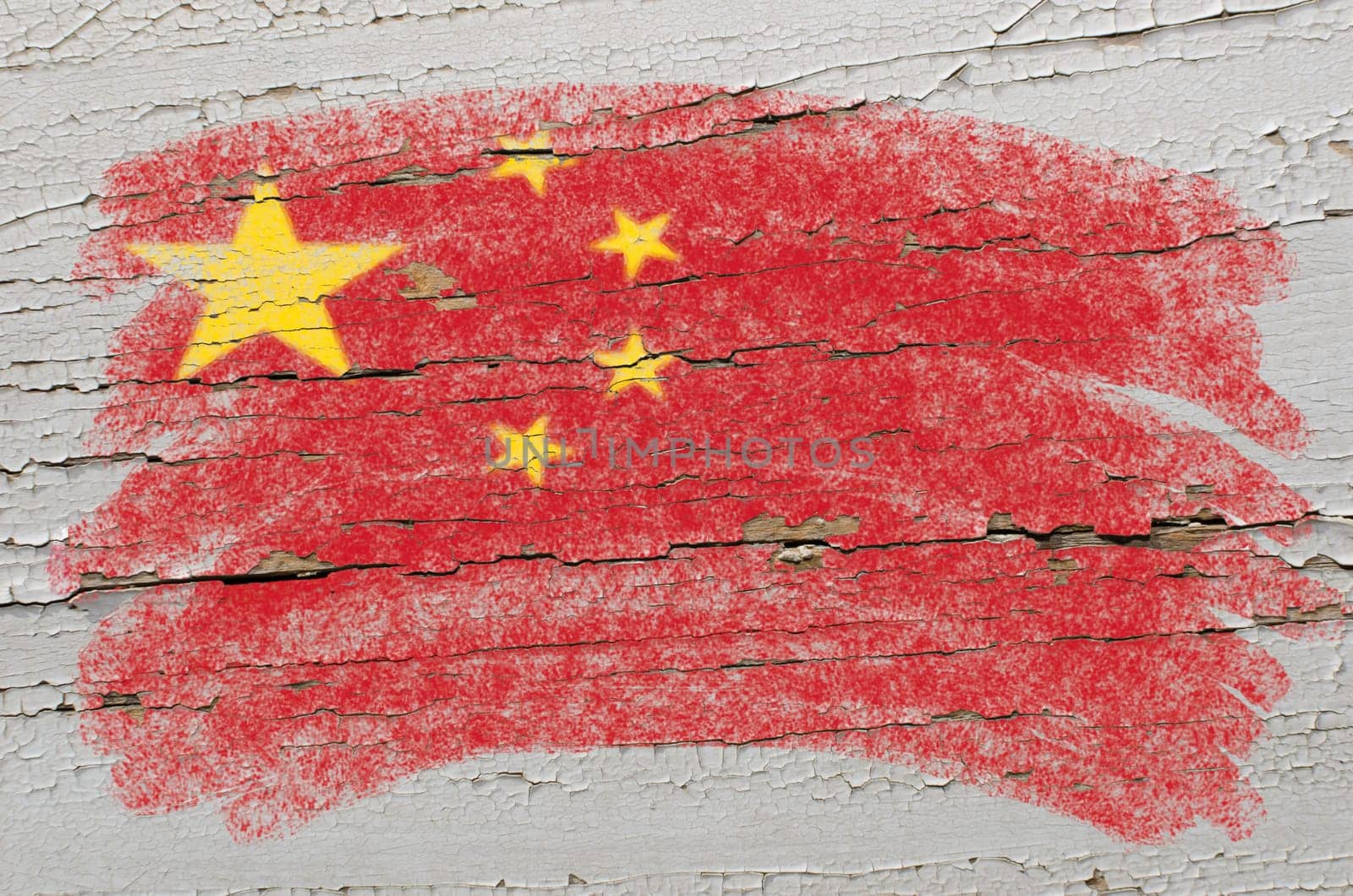 Chalky chinese flag painted with color chalk on grunge wooden texture