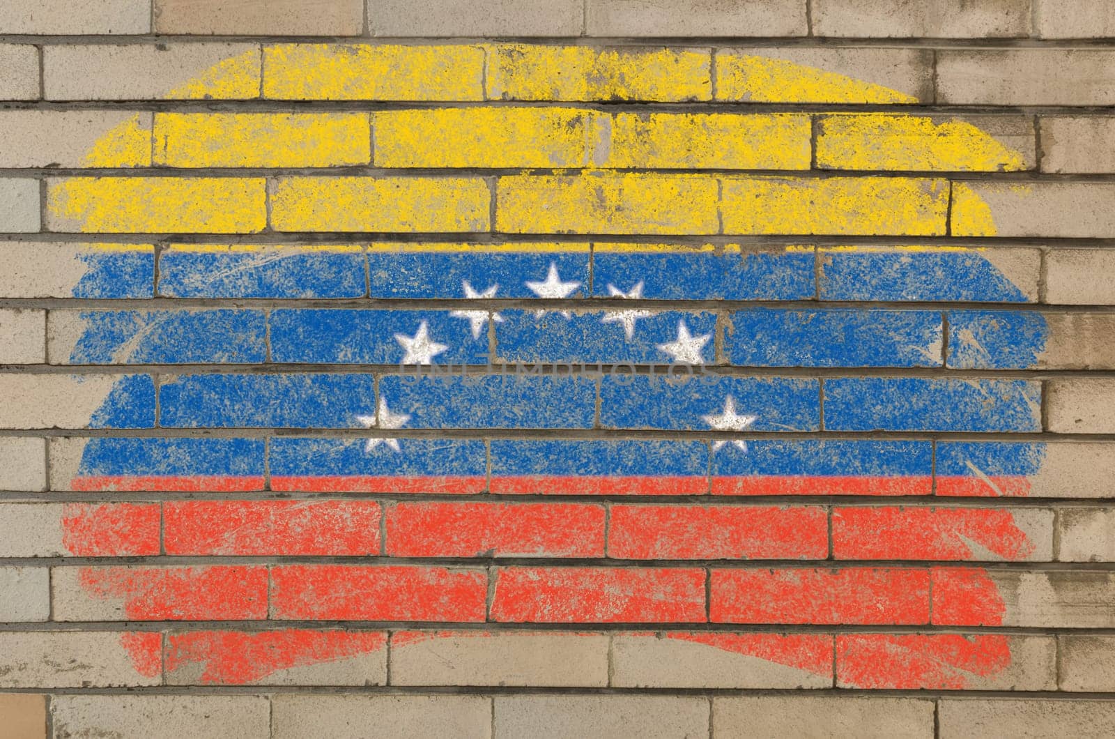Chalky  flag painted with color chalk on grunge old brick wall