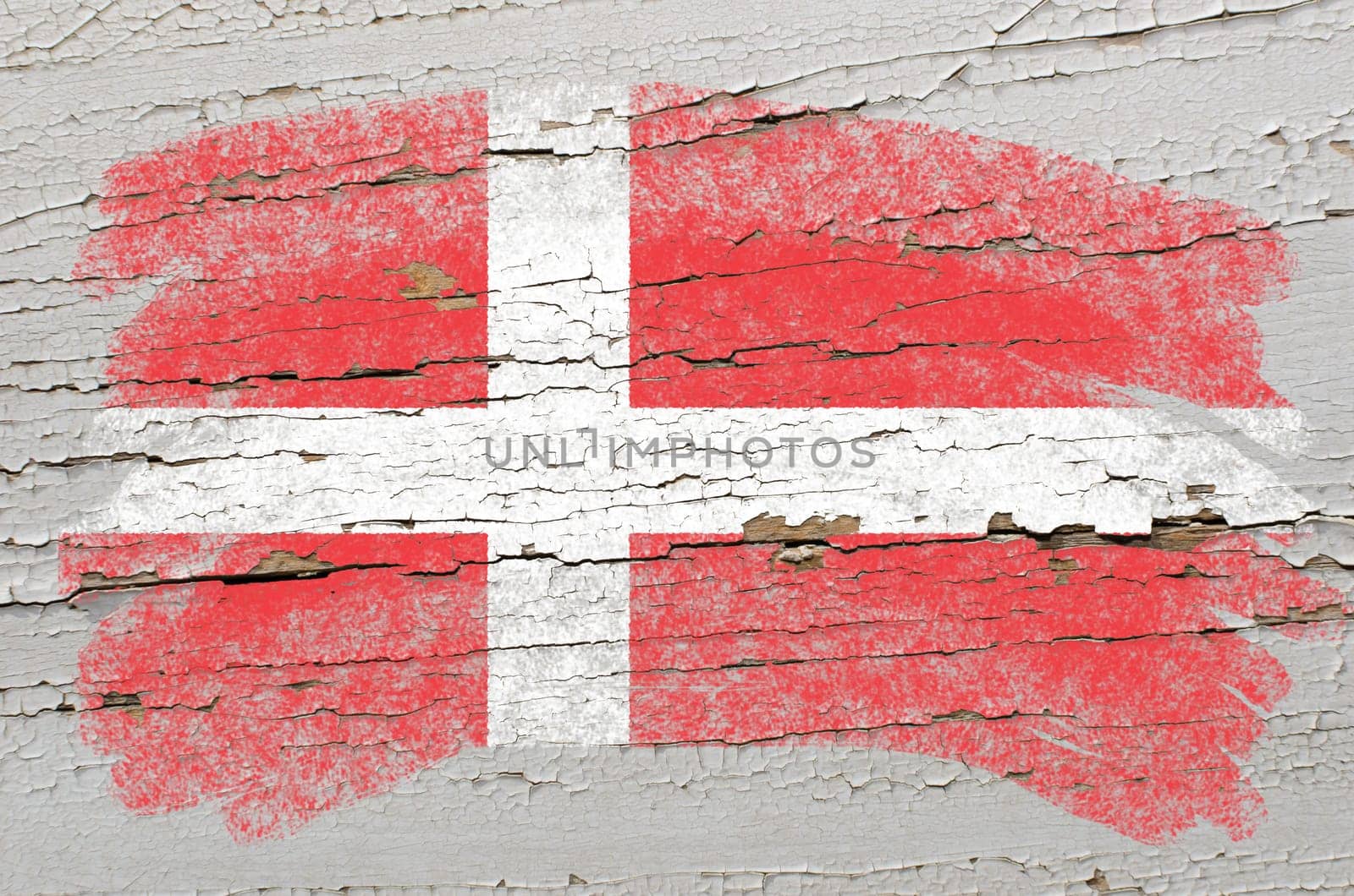 Chalky danish flag painted with color chalk on grunge wooden texture