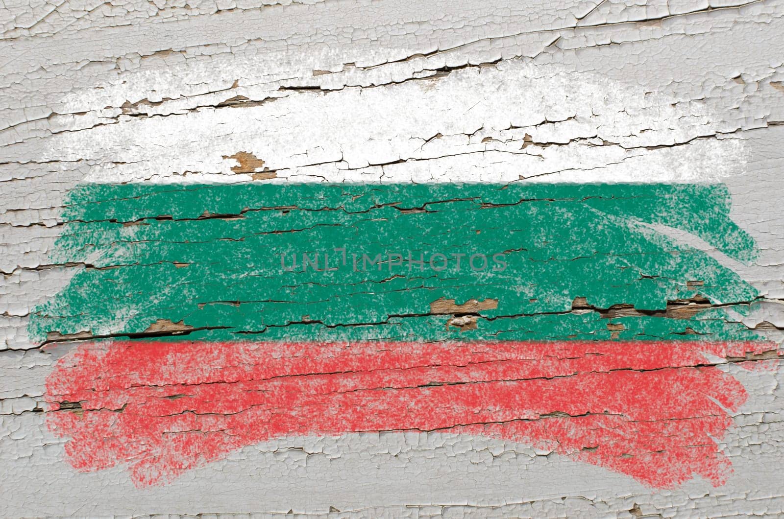 Chalky bulgarian flag painted with color chalk on grunge wooden texture