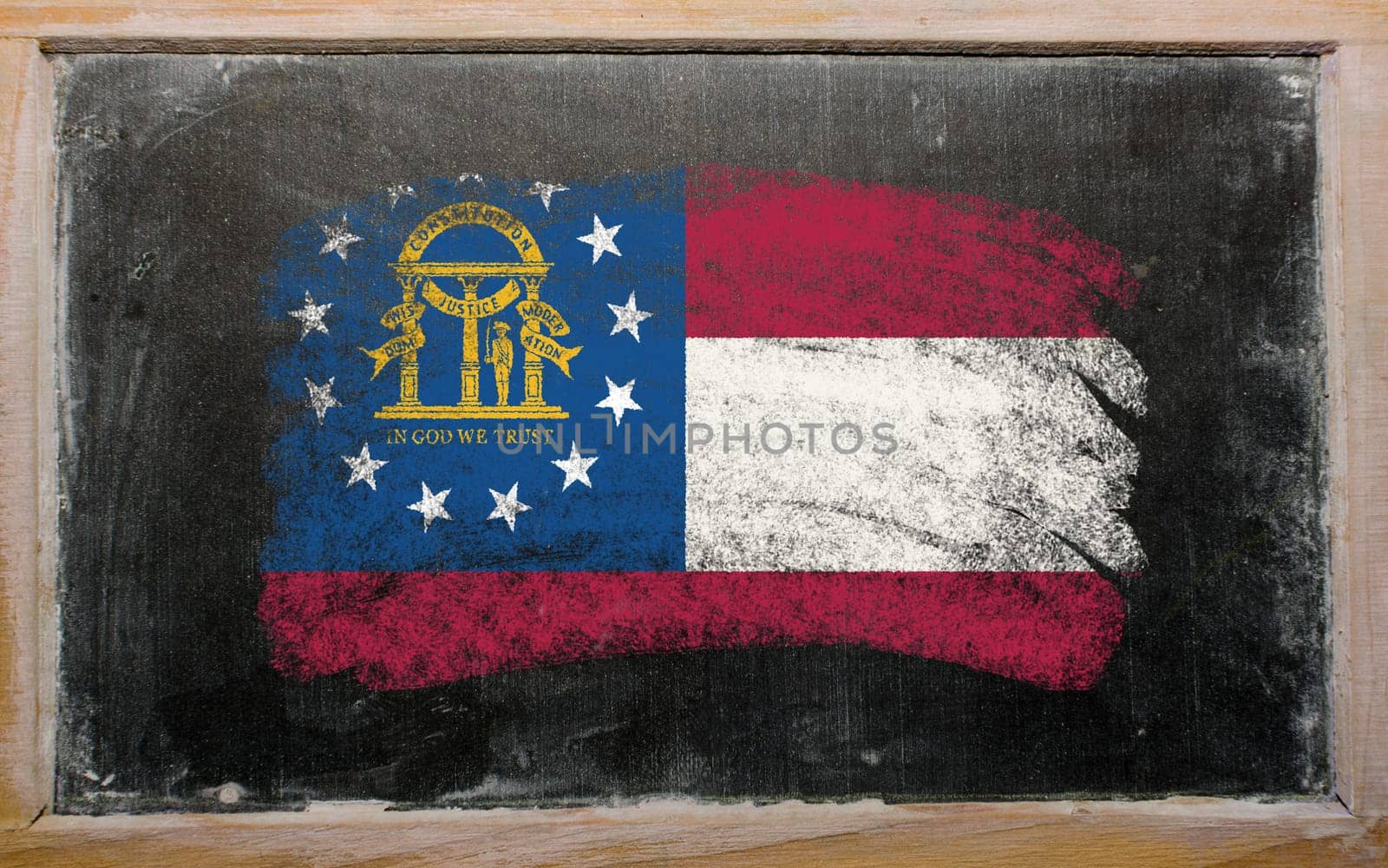 Chalky georgian flag painted with color chalk on old blackboard