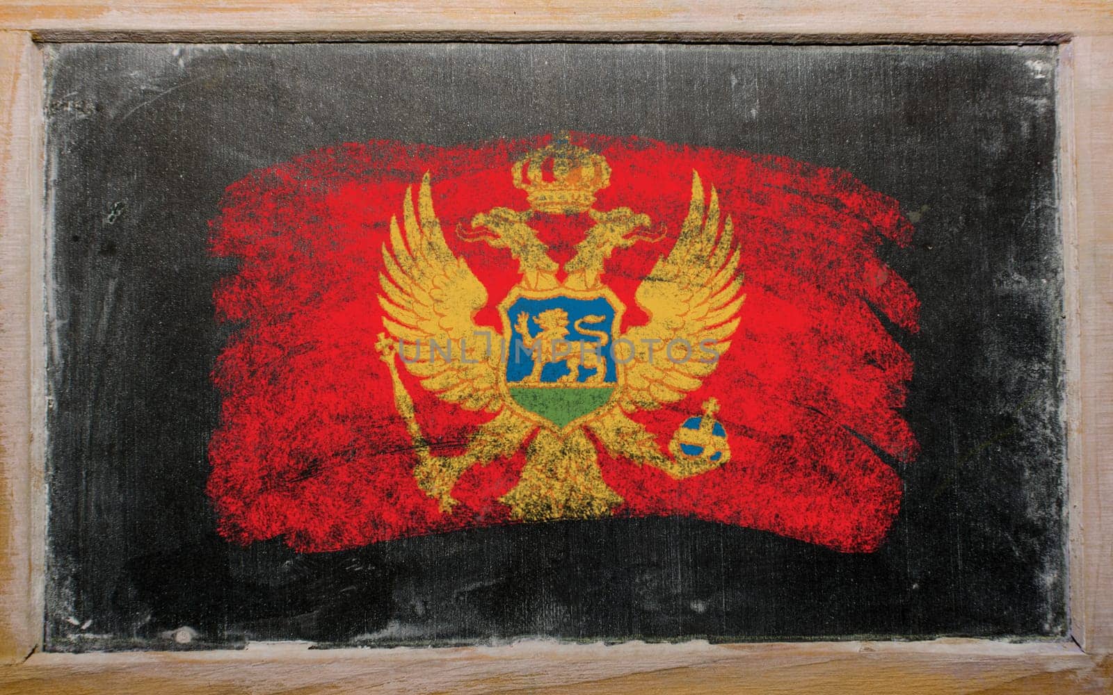 Chalky  flag painted with color chalk on old blackboard