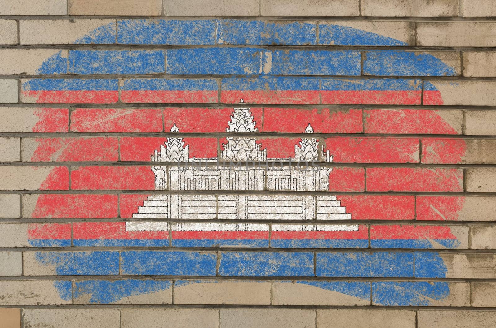 Chalky cambodian flag painted with color chalk on grunge old brick wall