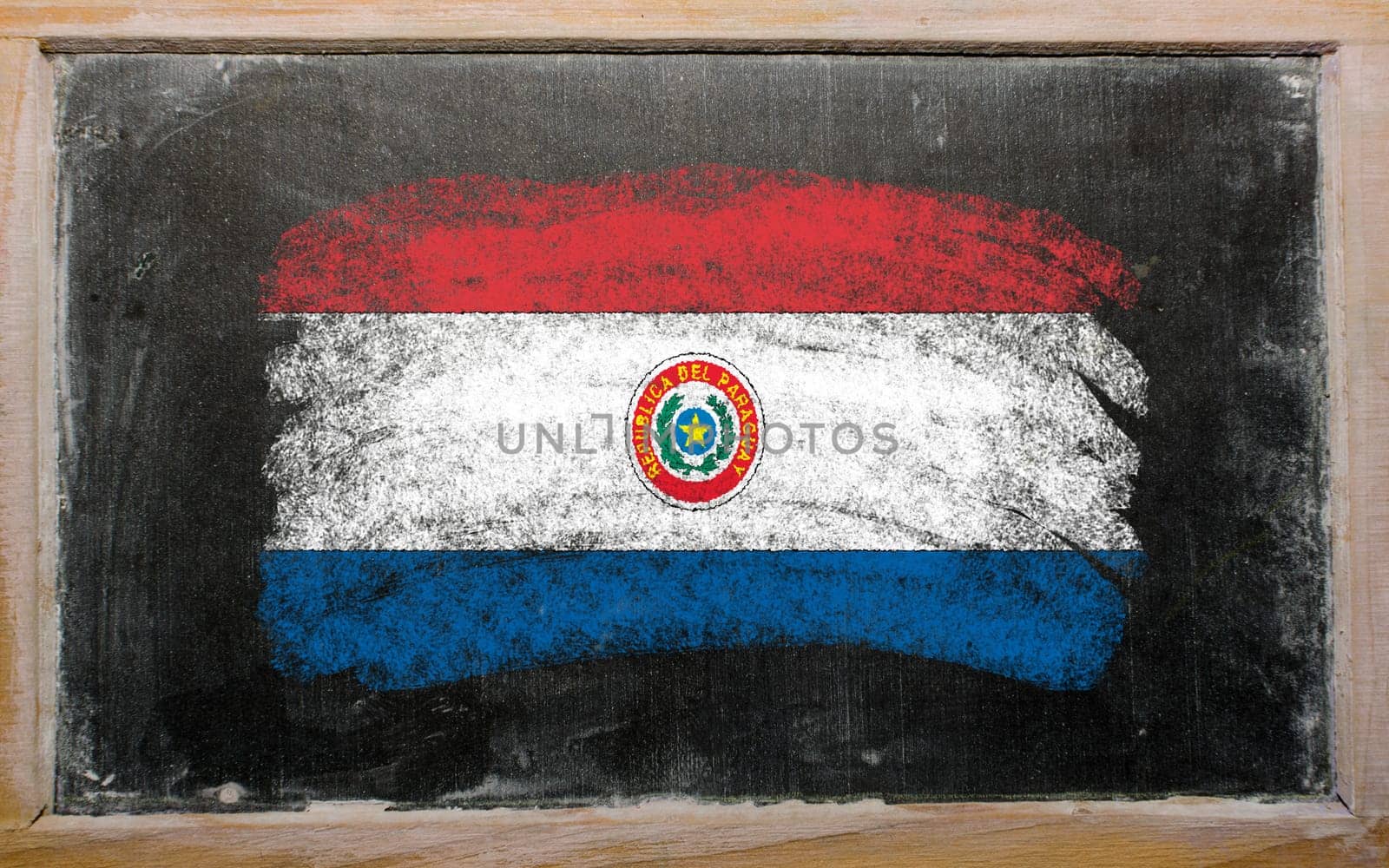 Chalky paraguay flag painted with color chalk on old blackboard