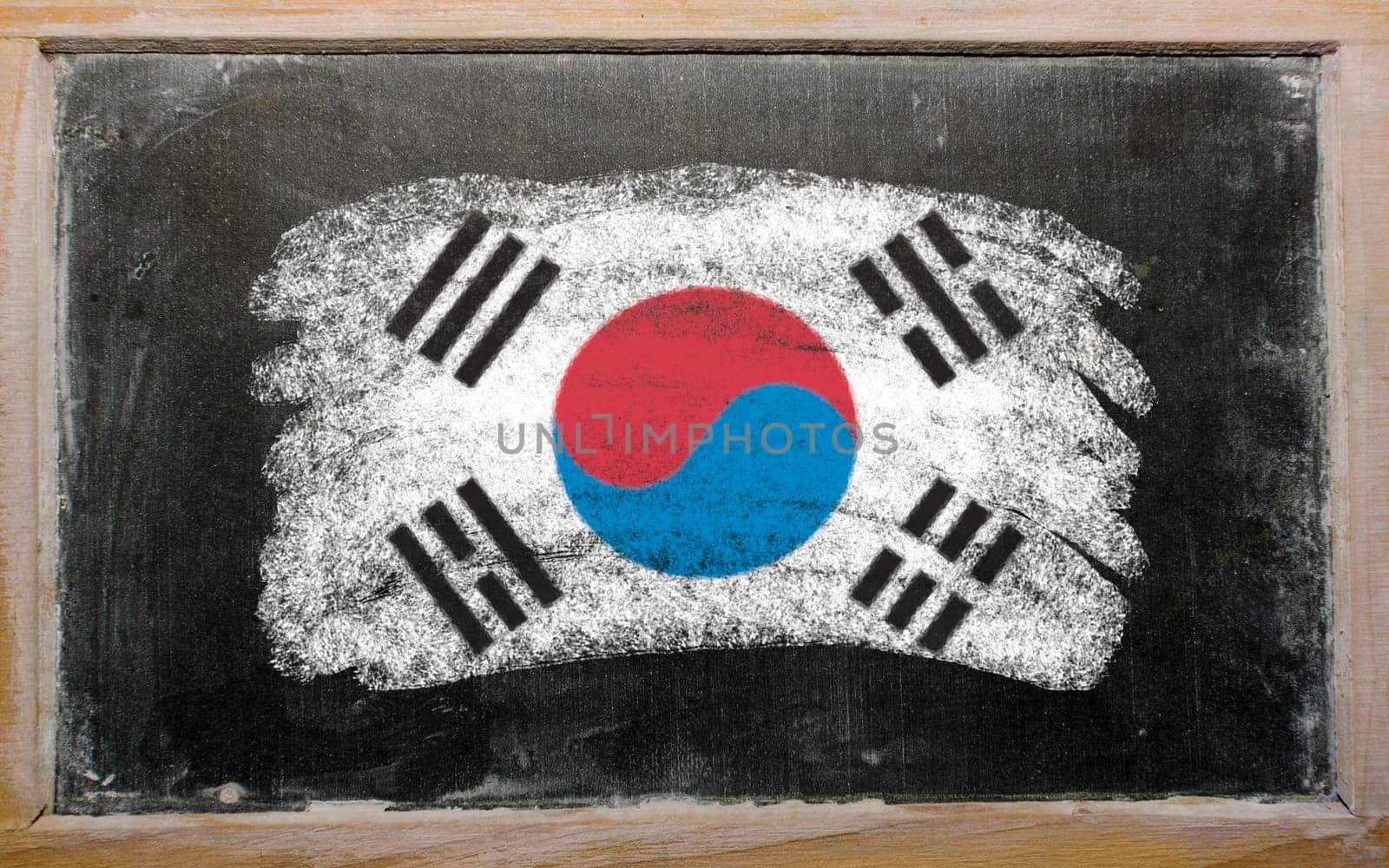 Chalky South Korean flag painted with color chalk on old blackboard