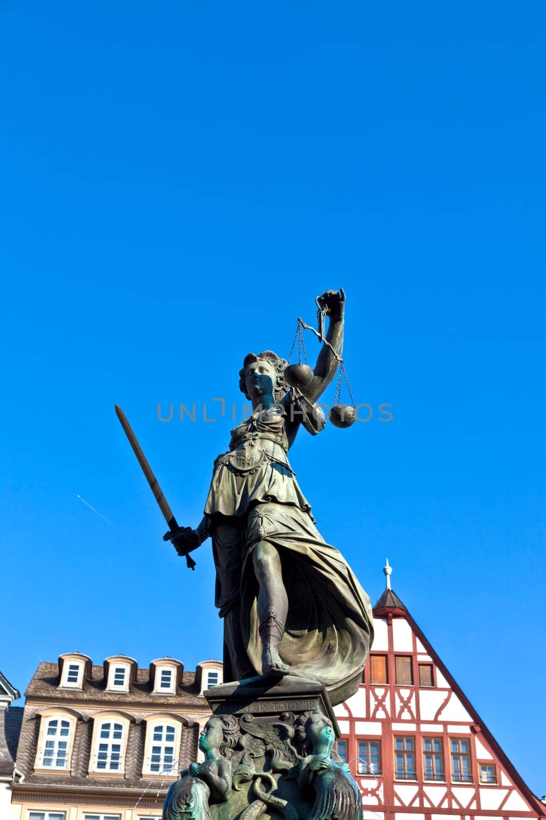 Statue of Lady Justice in front of the Romer in Frankfurt - Germany