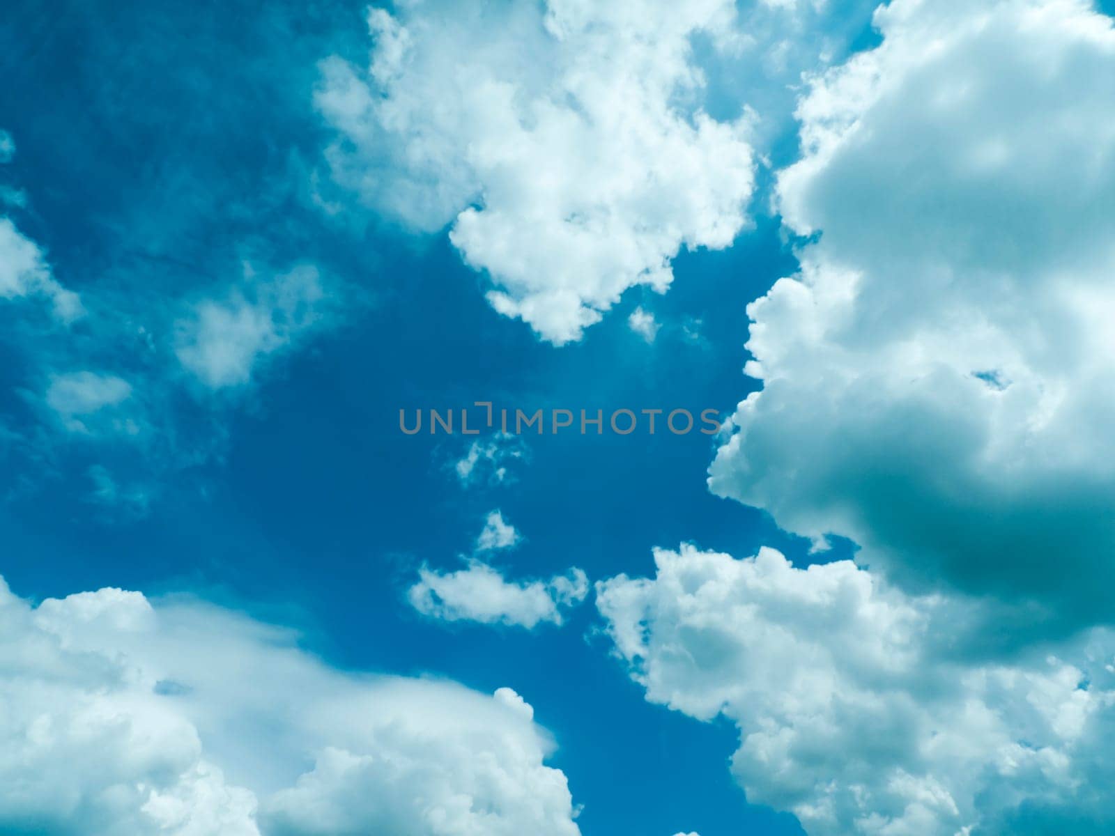 dramatic blue sky with clouds, for backgrounds.