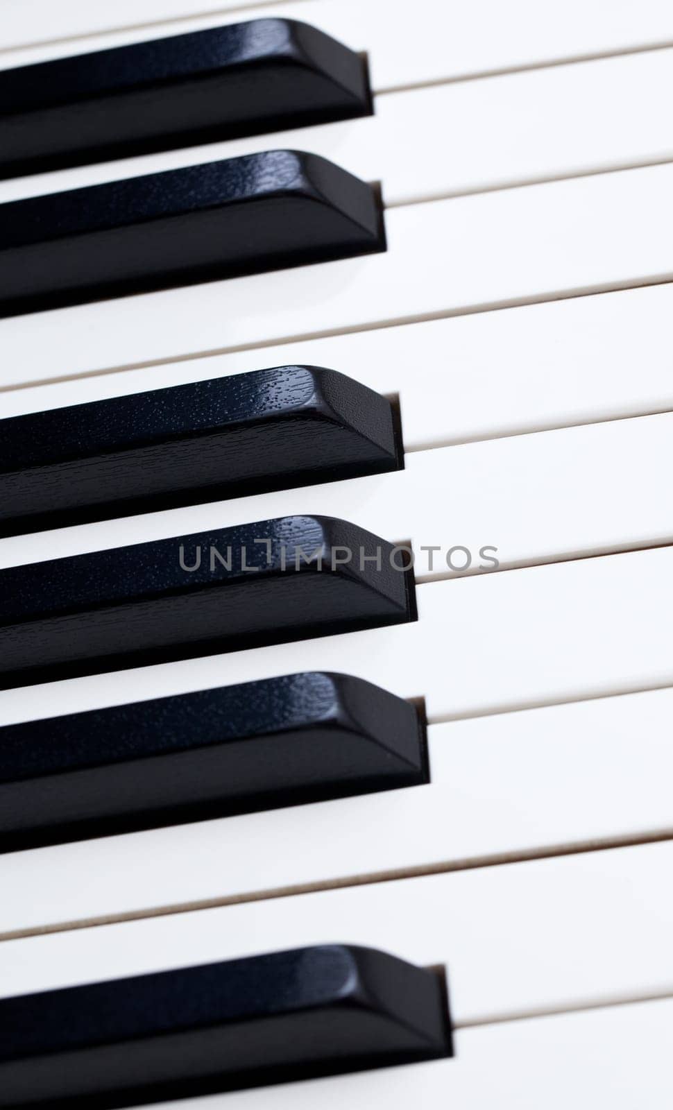 Close up image of the keys of a grand piano