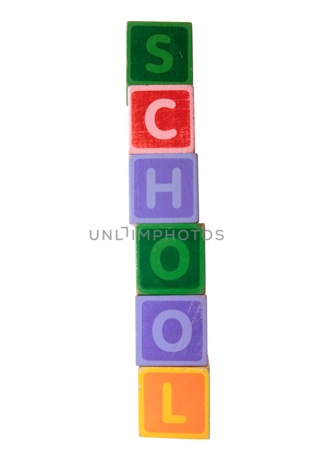 assorted childrens toy letter building blocks against a white background that spell school with clipping path