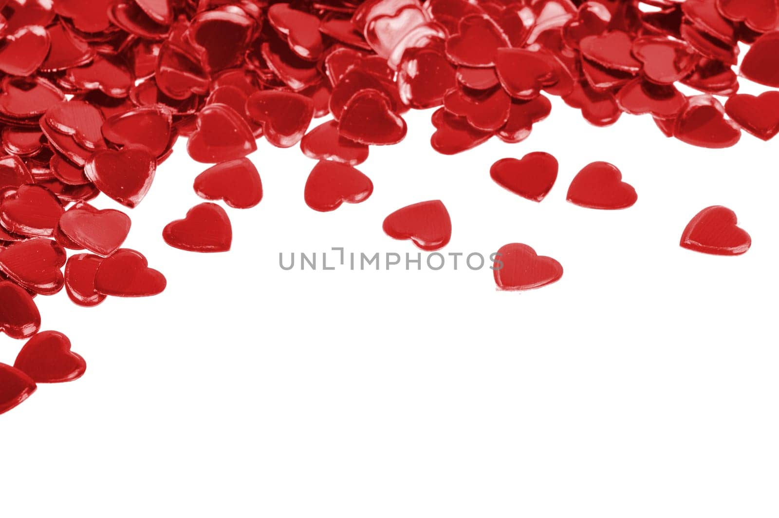 Red hearts confetti isolated on white background