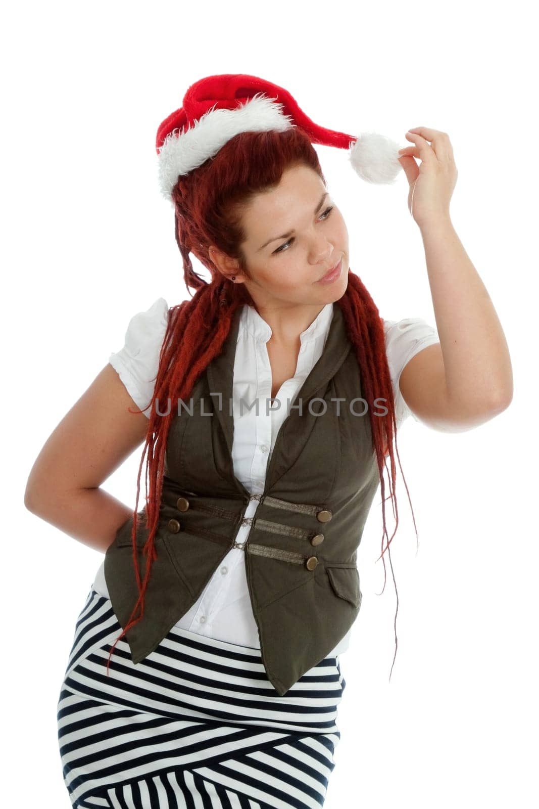 Young modern girl wearing Santa Claus hat isolated on white background.