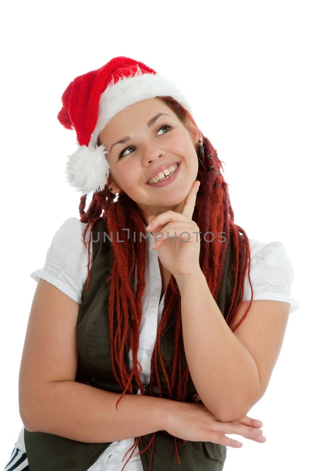 Young modern girl wearing Santa Claus hat isolated on white background.