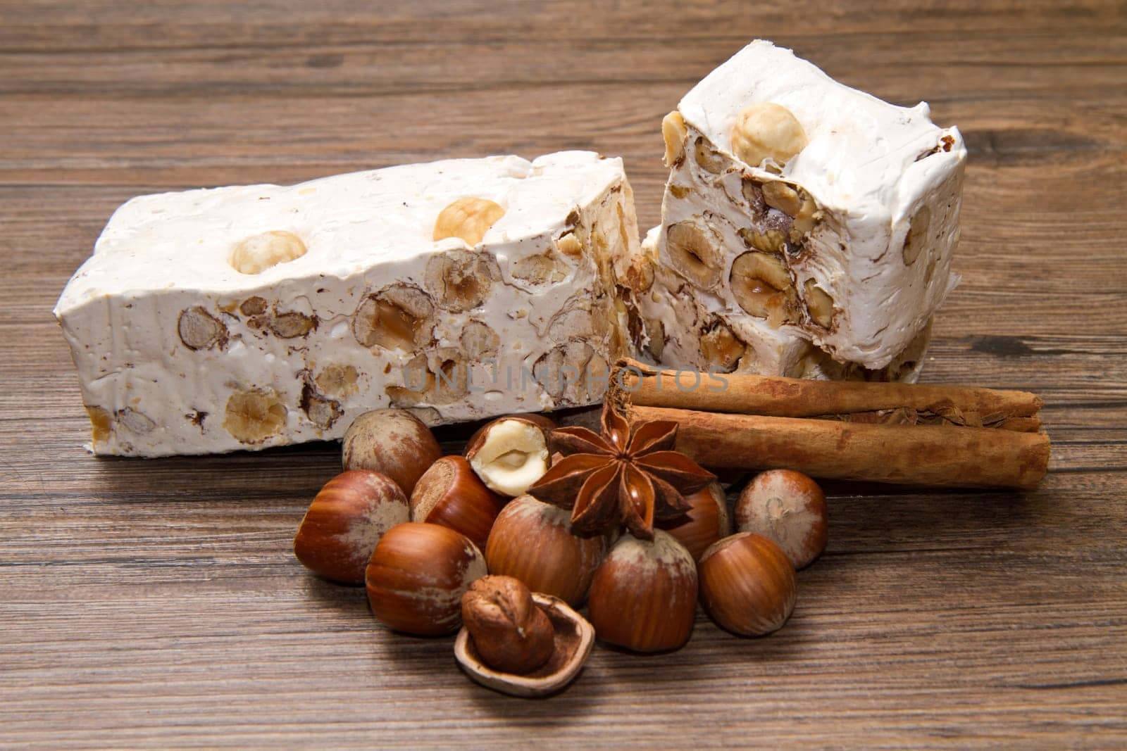 nougat with hazelnut on wooden table