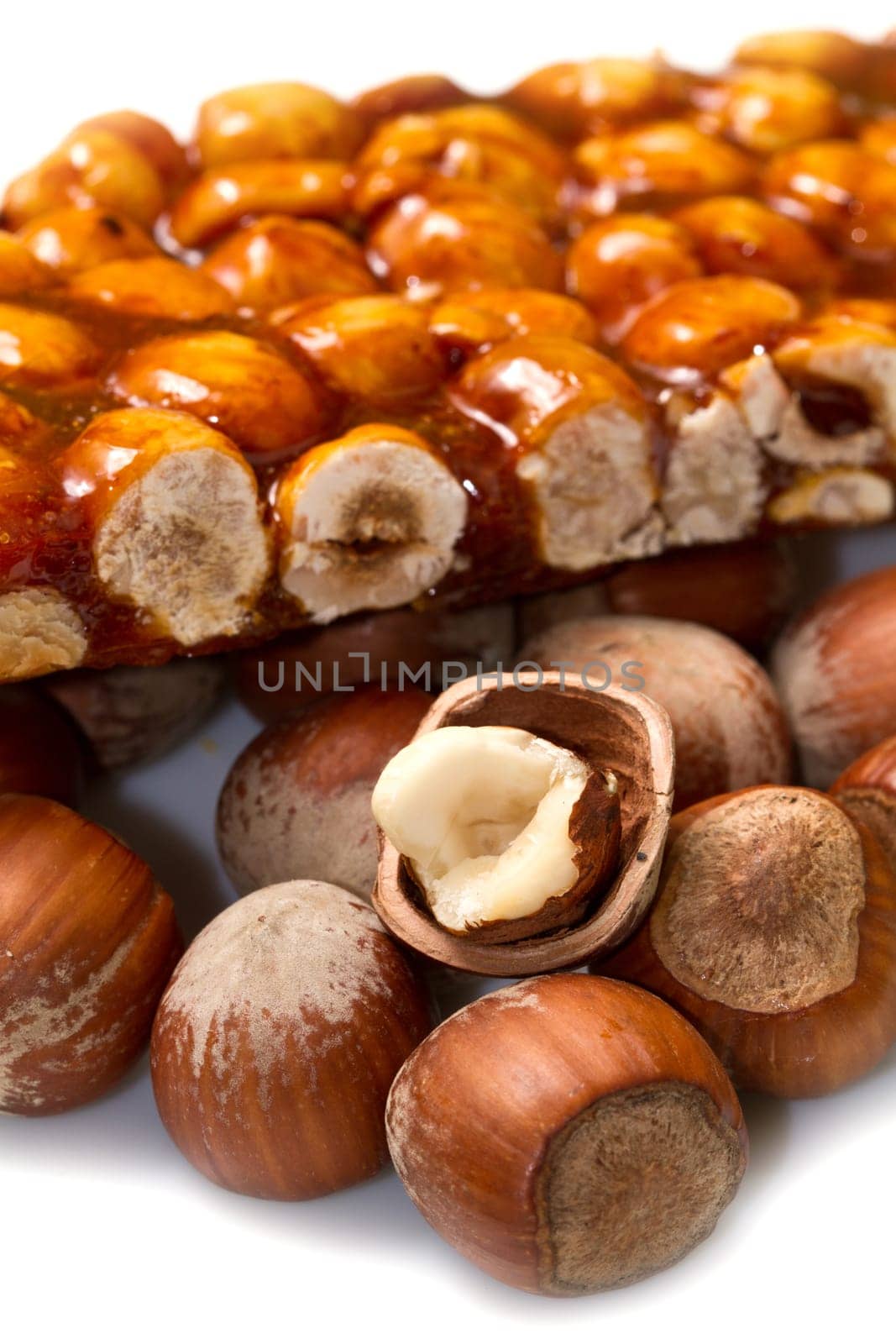 hazelnut brittle on white close up