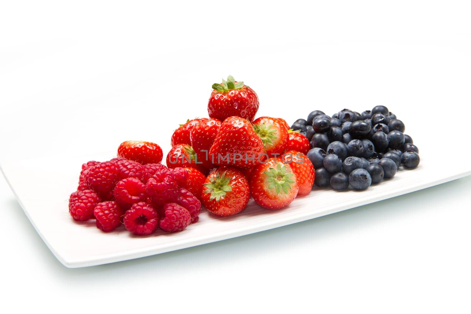 fresh berries on white background