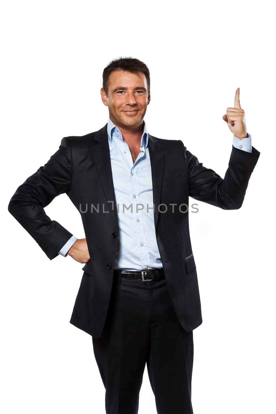 one caucasian business man pointing up finger blank copy space in studio isolated on white background