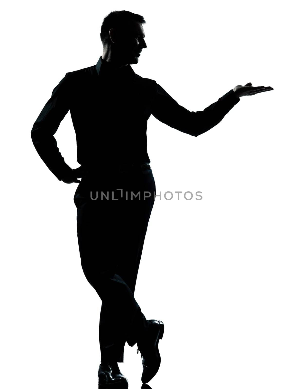 one caucasian business man silhouette standing hand open  Full length in studio isolated on white background