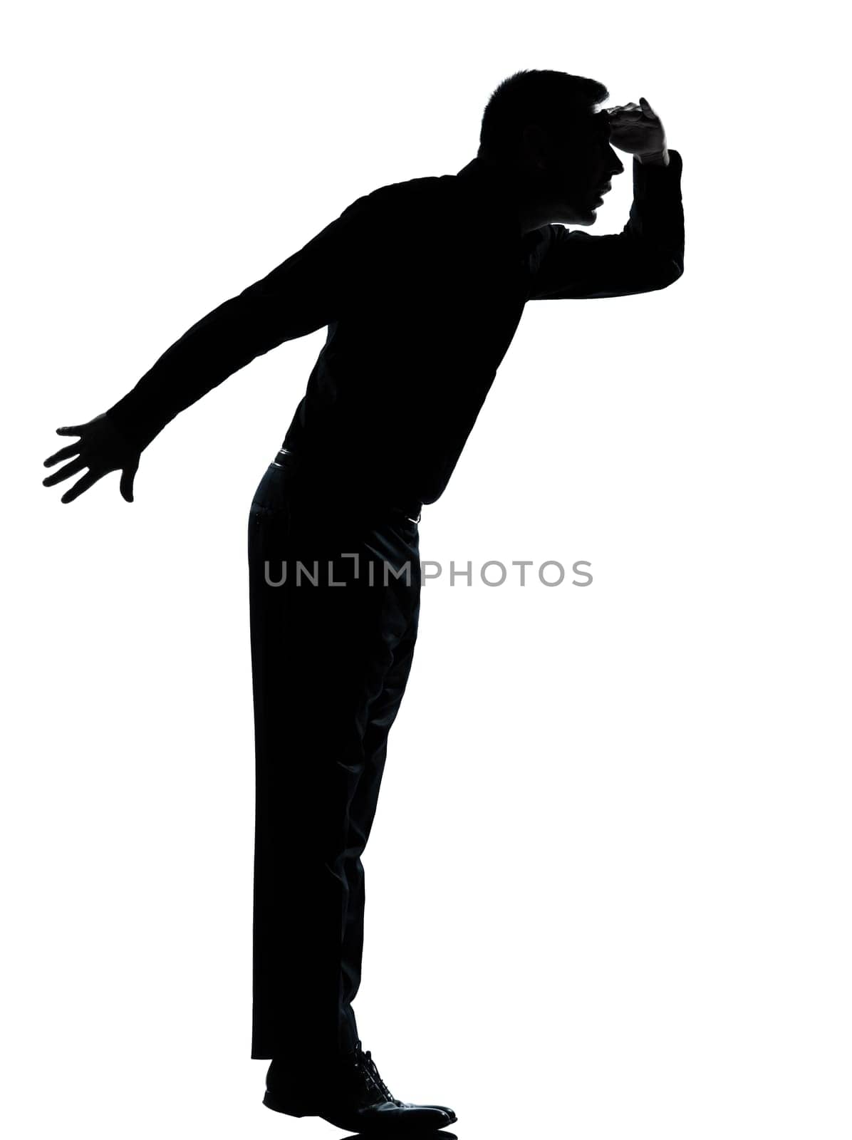 one caucasian business man silhouette standing tiptoe looking away Full length in studio isolated on white background