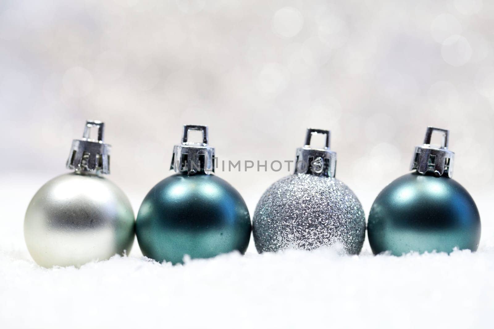 Christmas baubles in the snow