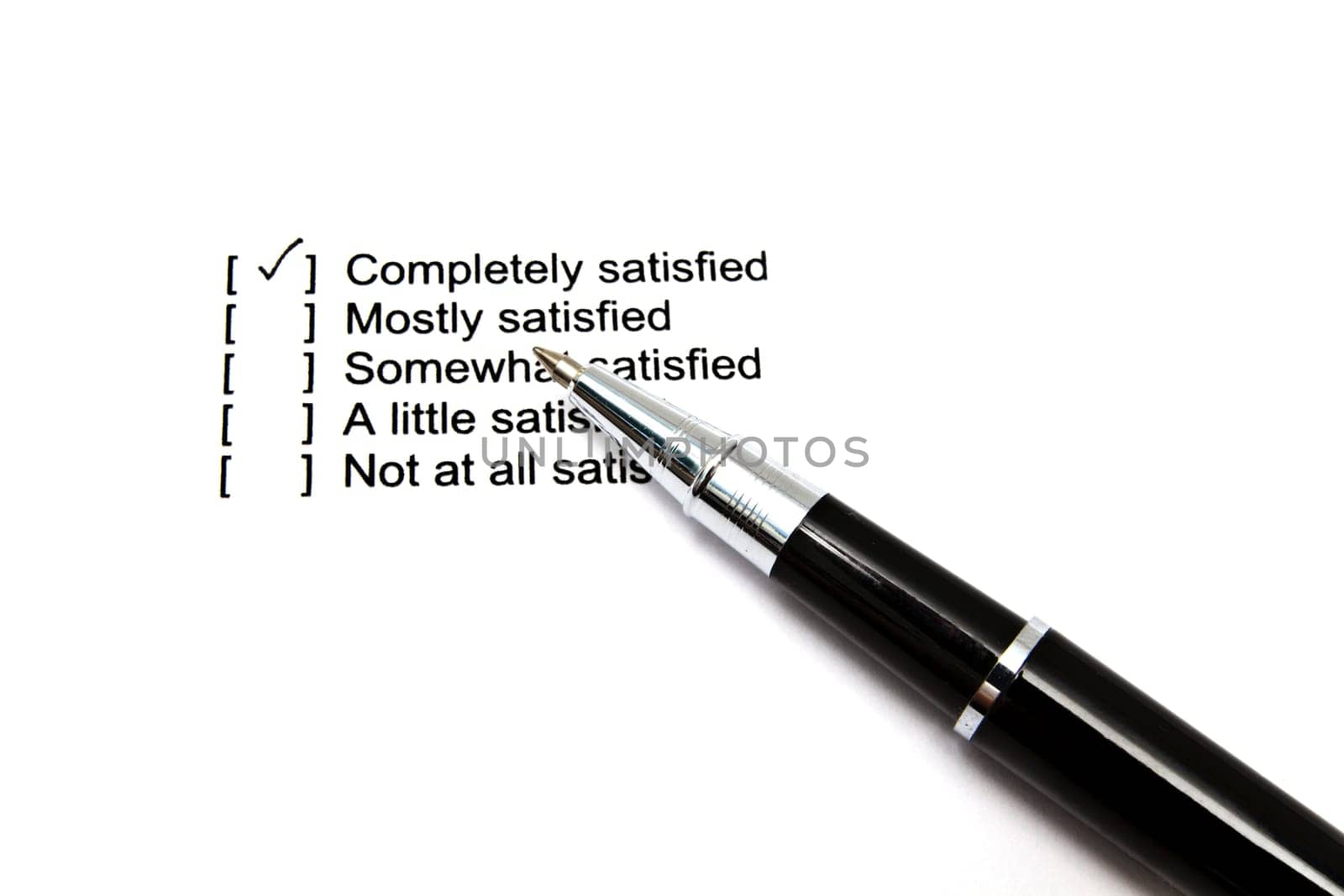Pen and questionnaire on white background