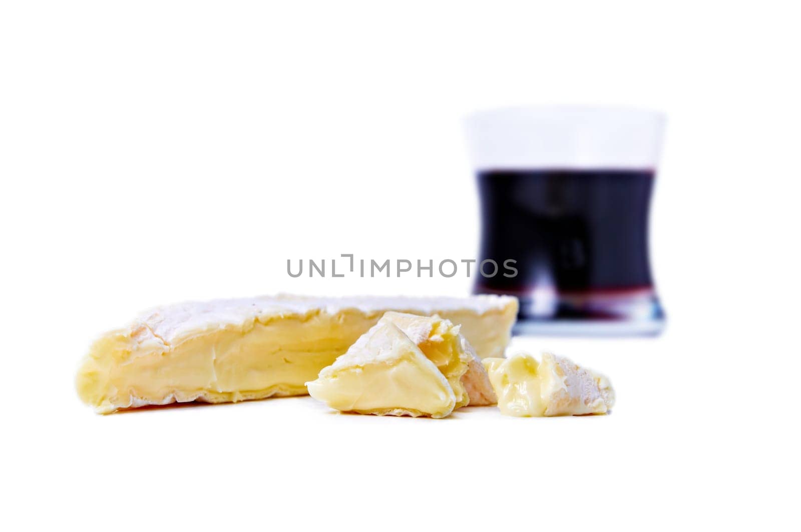 Brie cheese and gas of red wine isolated on white