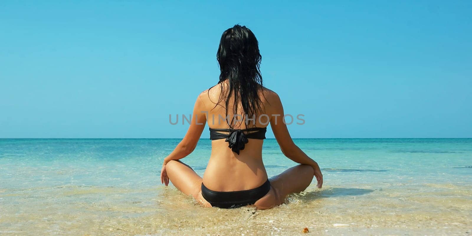 Beautiful women on the beach. Relaxing landscape.