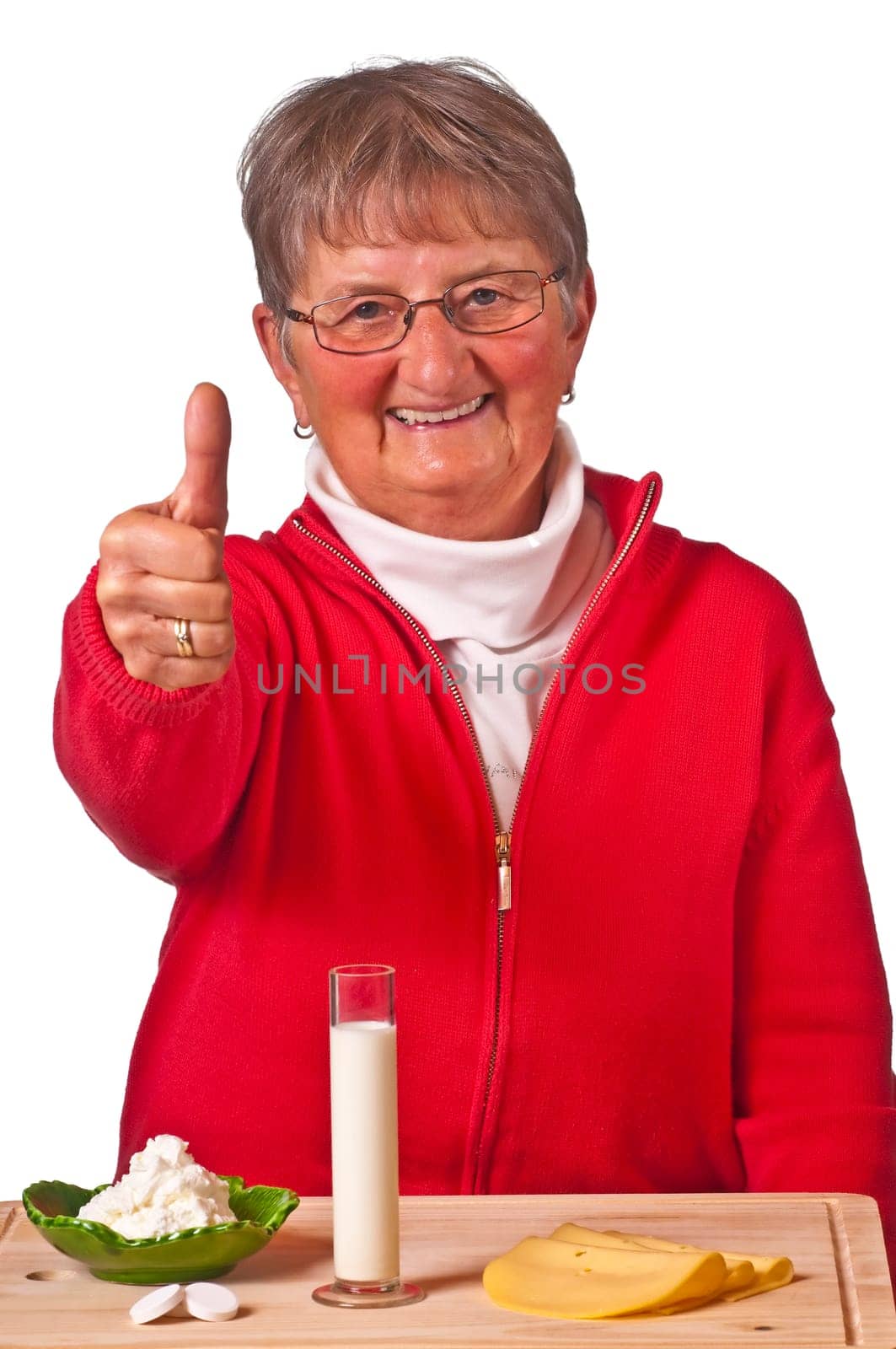 Senior woman with dairy products