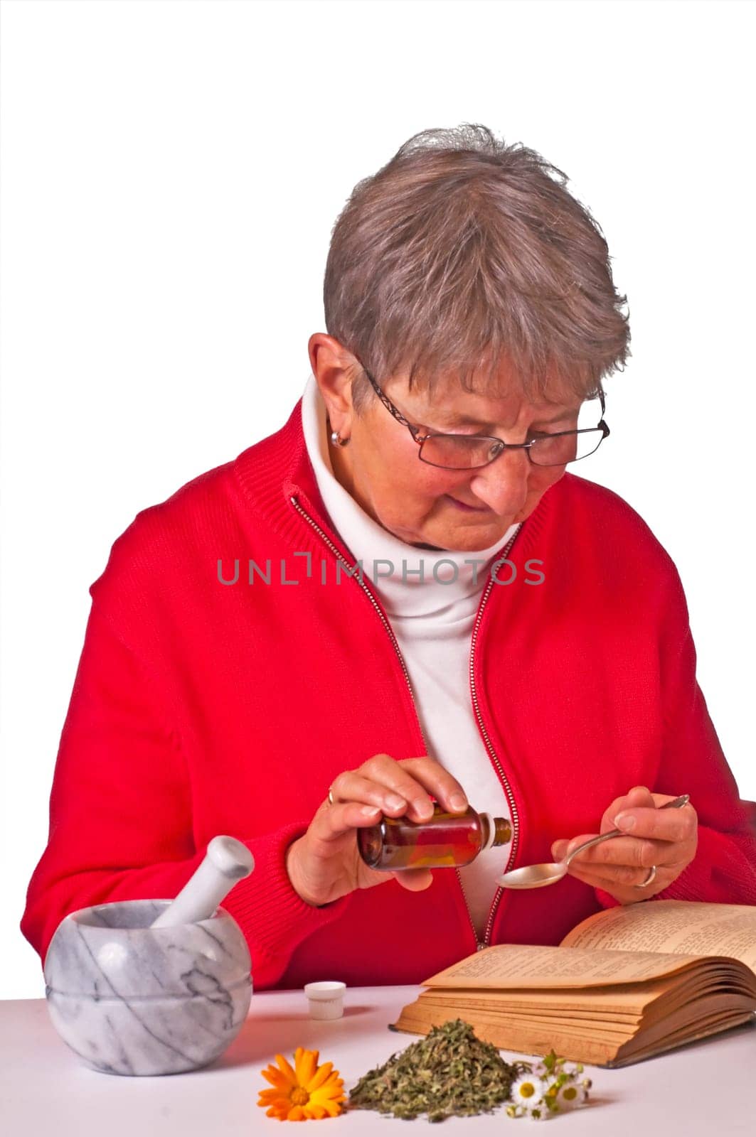 Senior woman with natural remedy