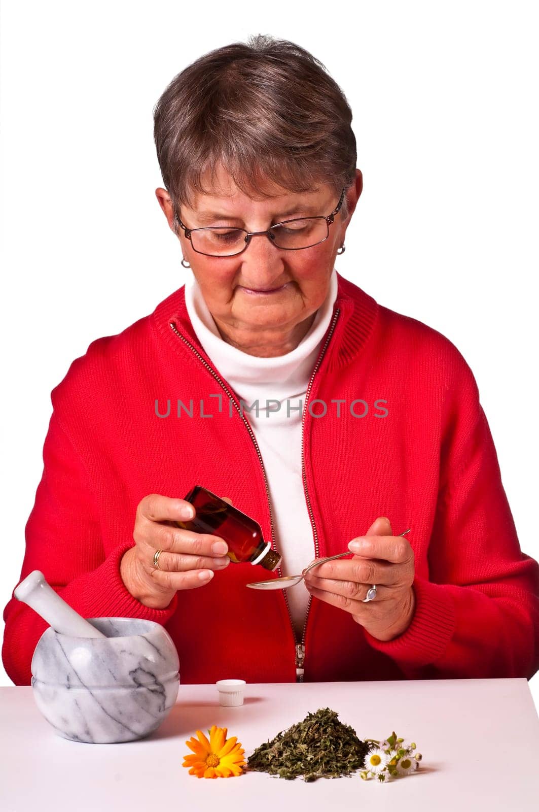 Senior woman with natural remedy