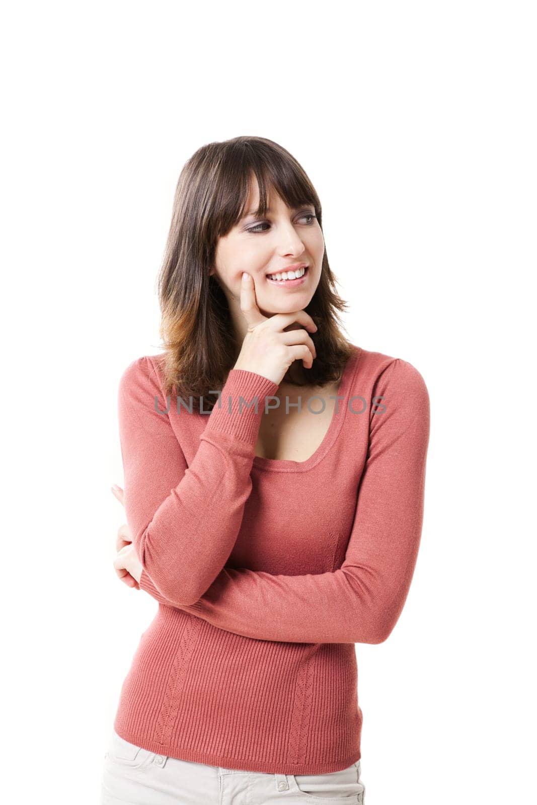 Portrait of a beautiful woman looking away smiling, isolated on a white background