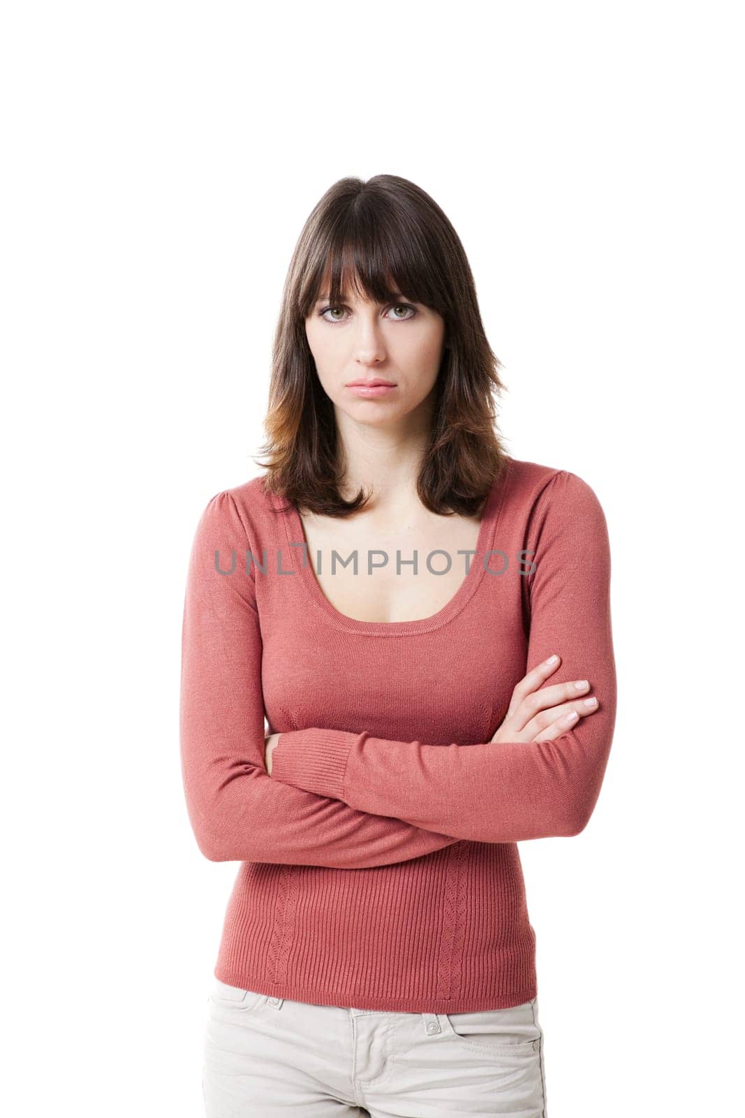 Beautiful woman looking sad. Studio shot isolated on white background