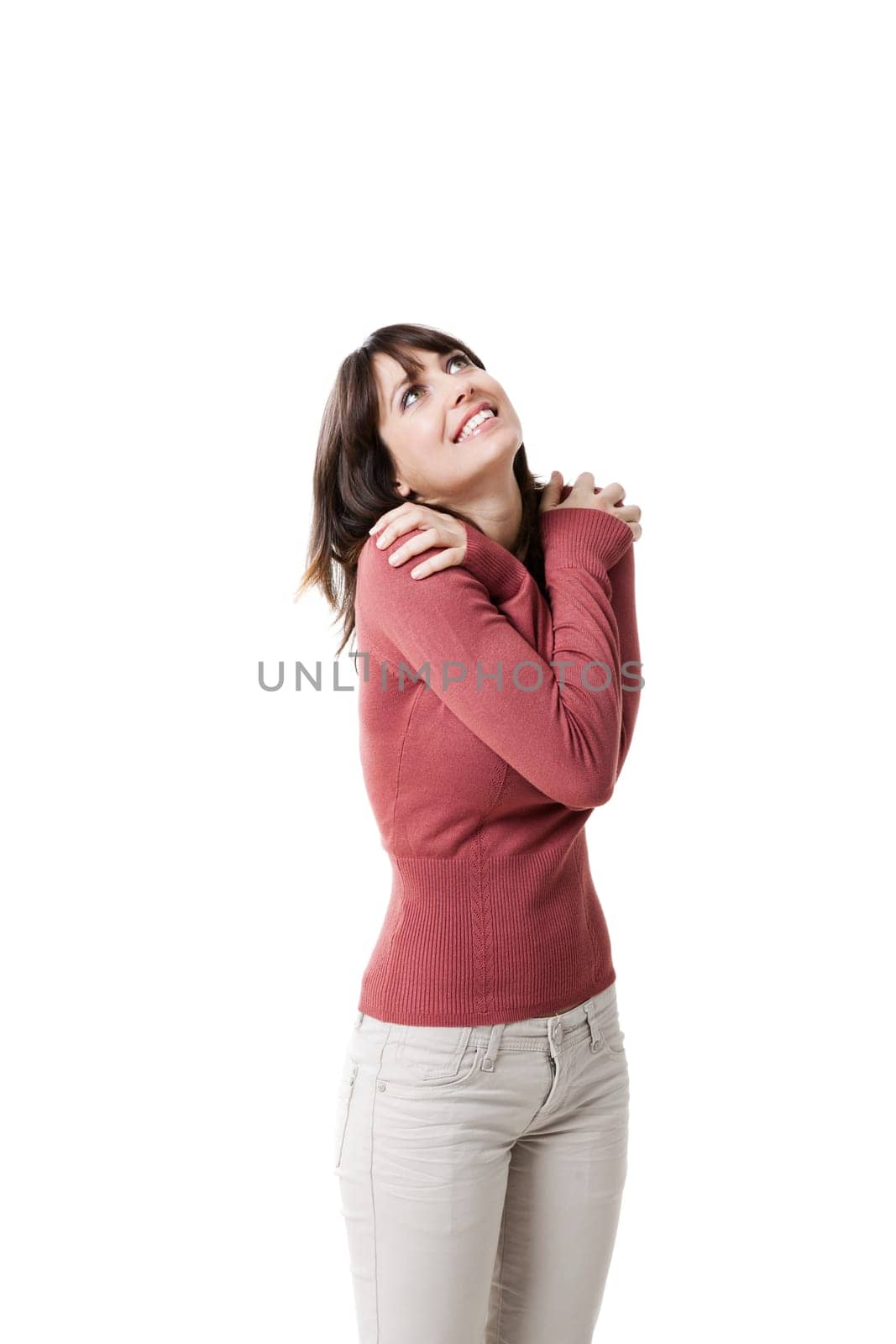 Beautiful woman smiling and looking up. Studio shot with isolated white background.
