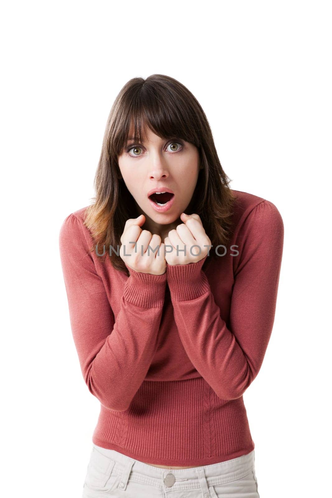 Beautiful woman looking surprised. Studio shot with isolated white background.