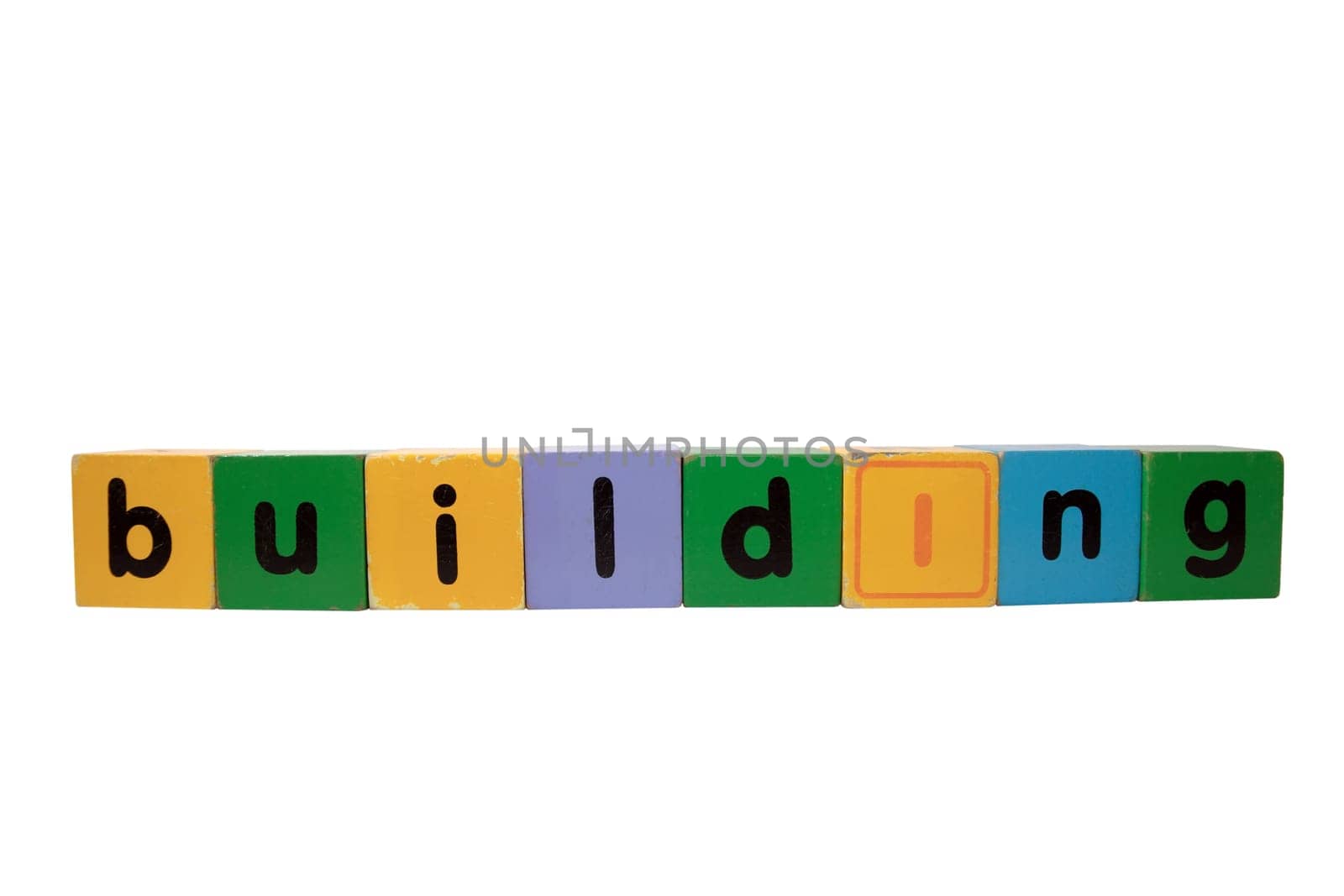 toy letters that spell building with white background with clipping path