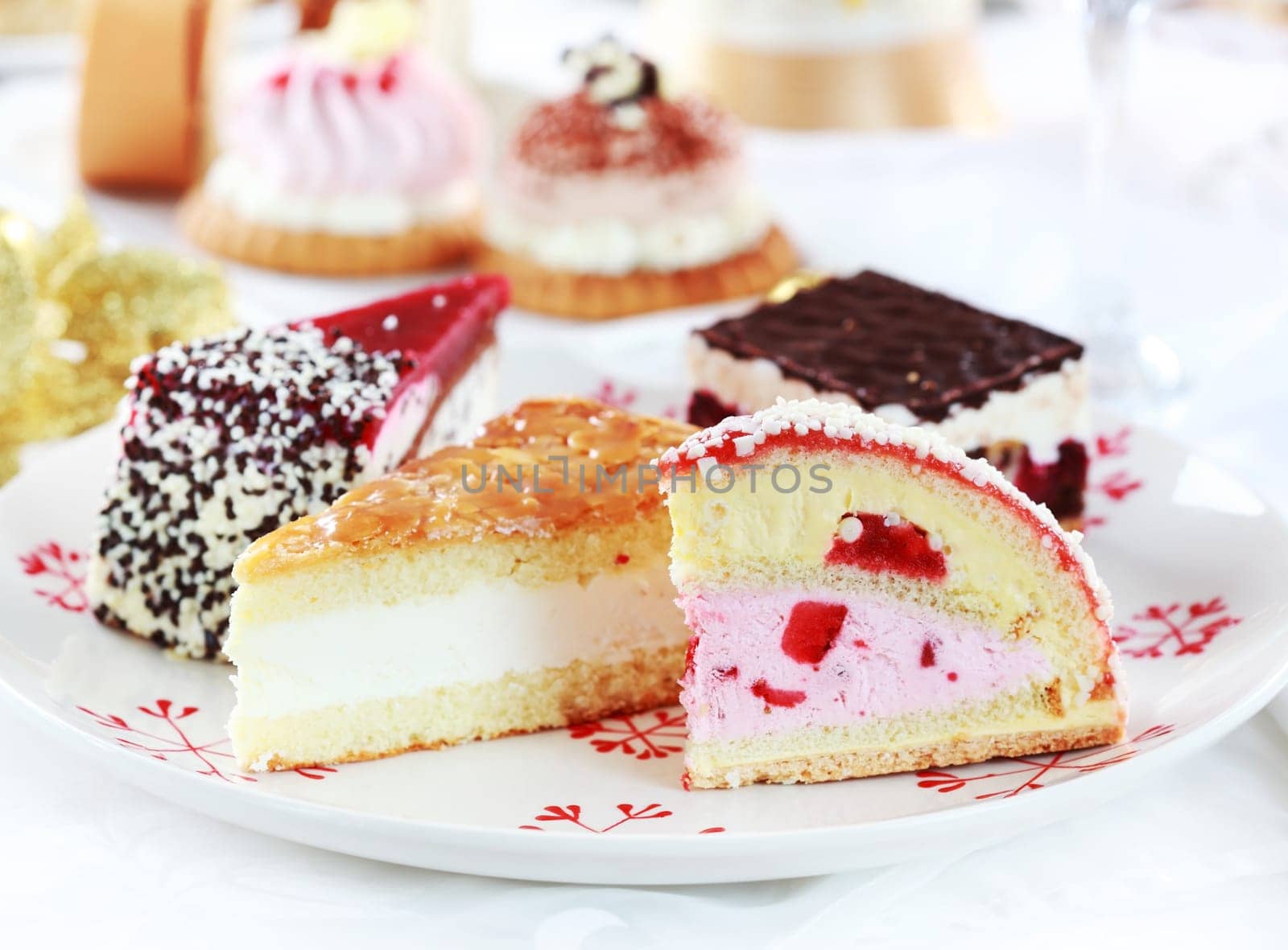 Assorted whipped cream cakes and other desserts