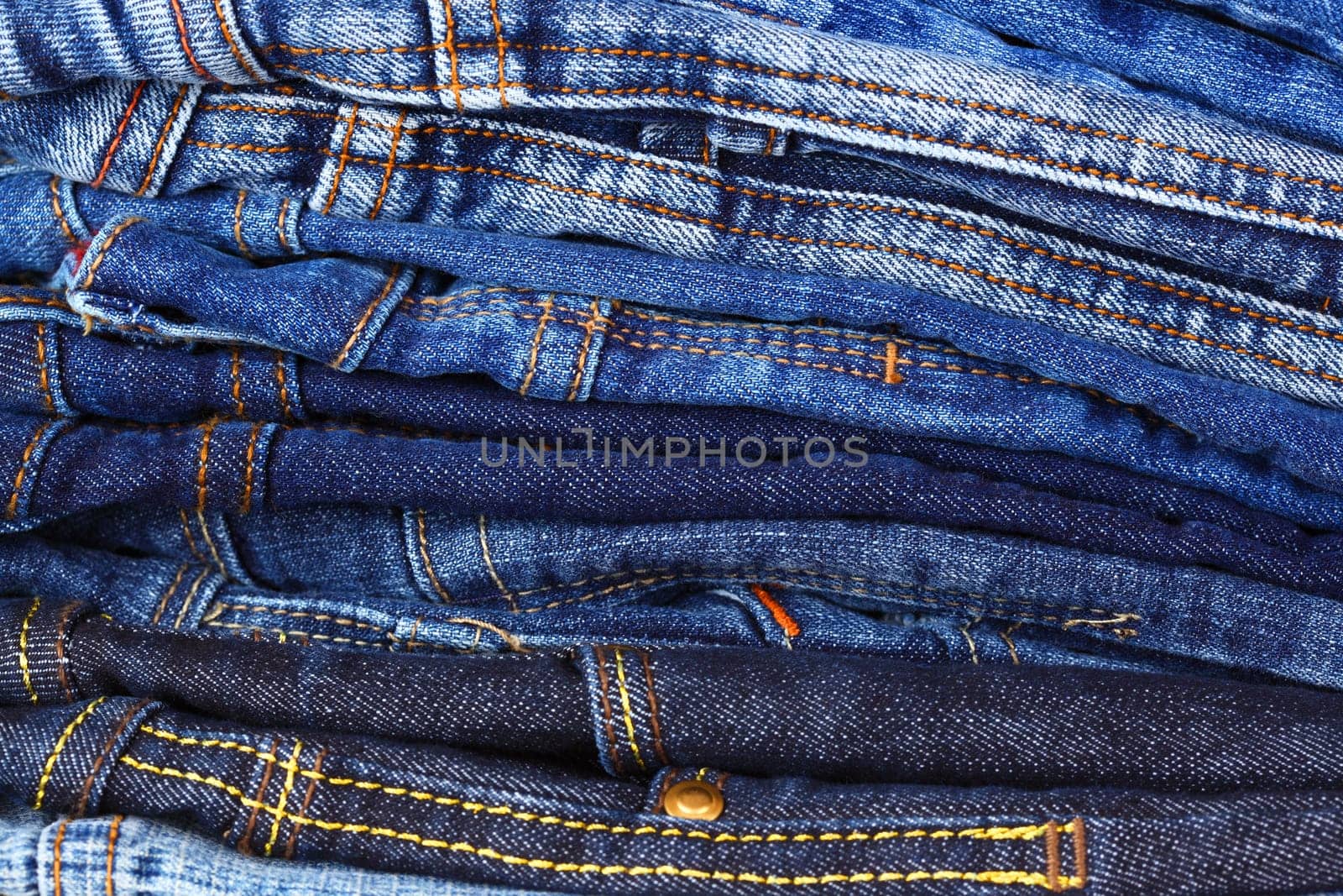 Stack of different jeans - detail
