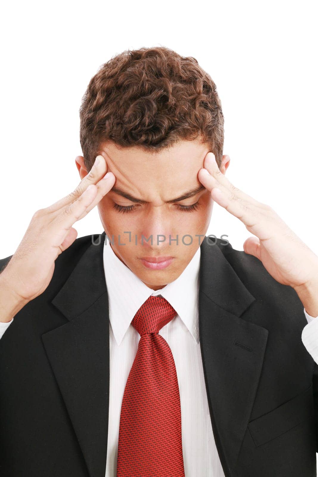 Attractive young man suffering from headache. All on white background.