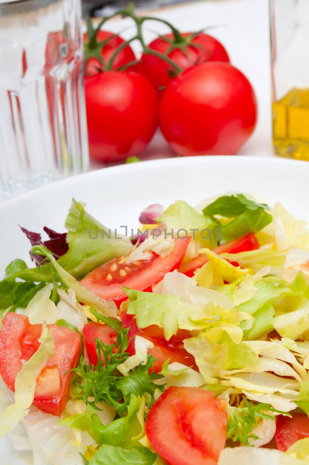 Salad of Fresh Green Vegetables in White Bowl