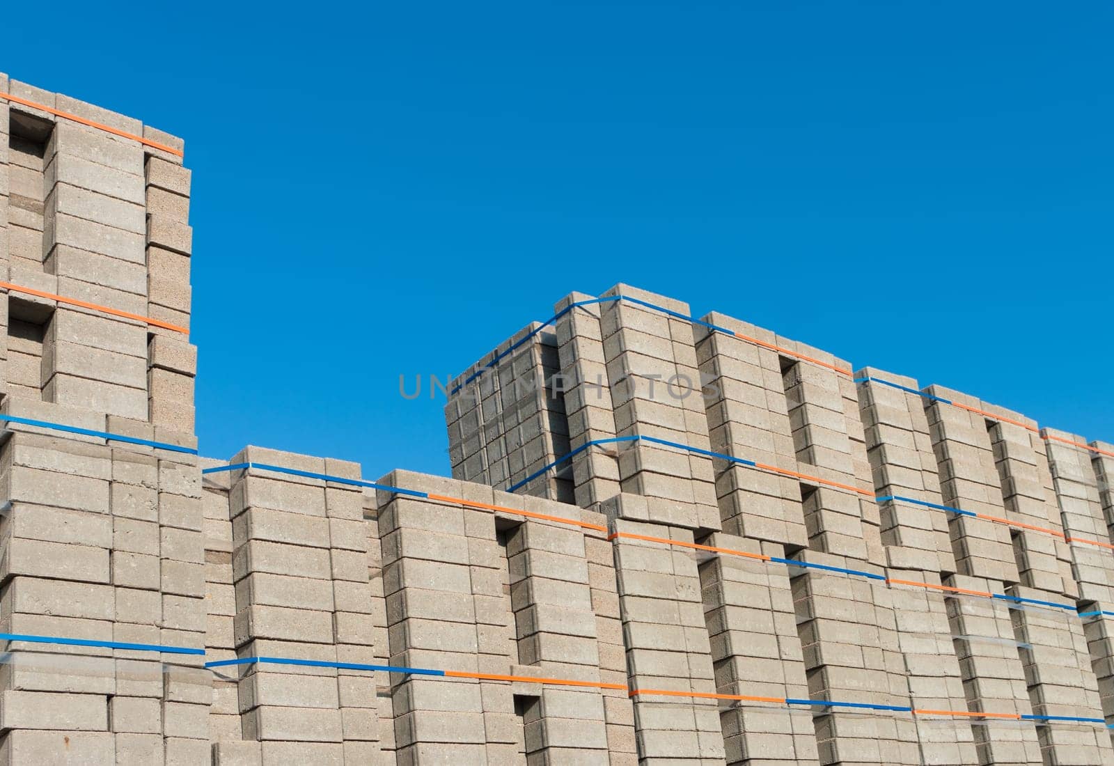 highly piled up bricks ready for transport