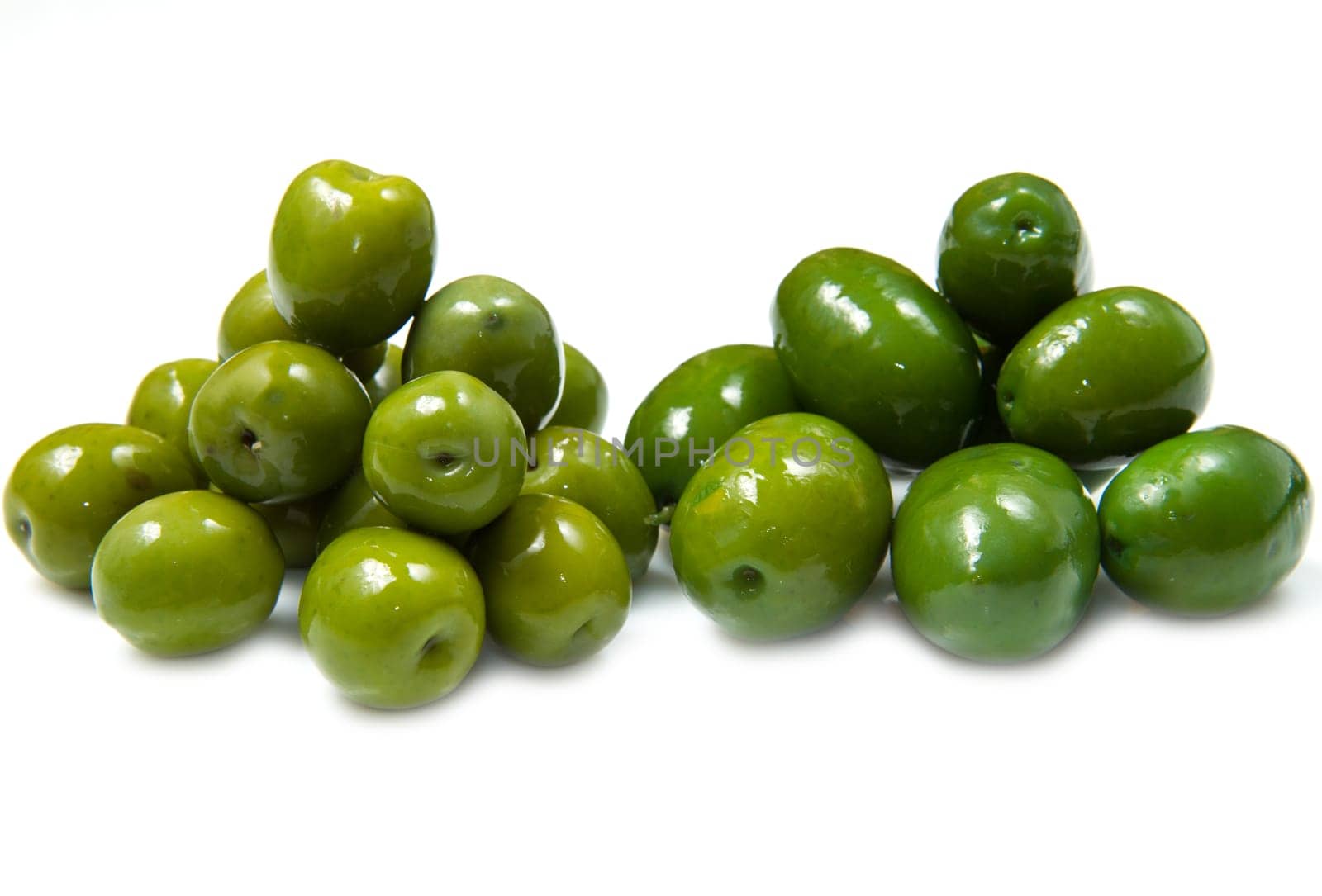 green olives  on a white background
