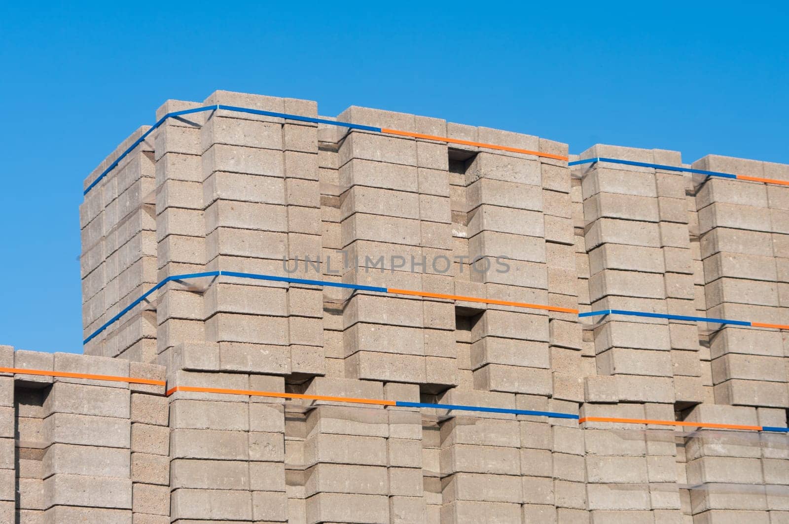 highly piled up bricks ready for transport